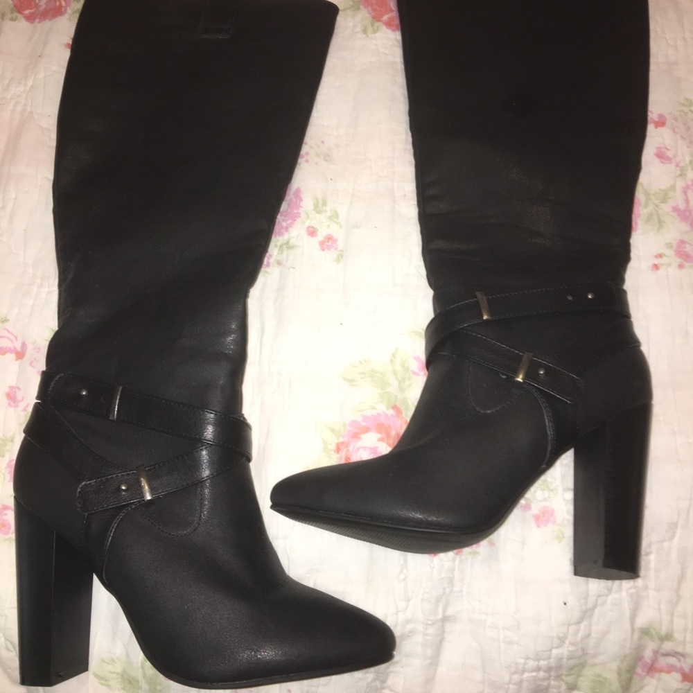 Knee high 3 1/2 inch heeled boots